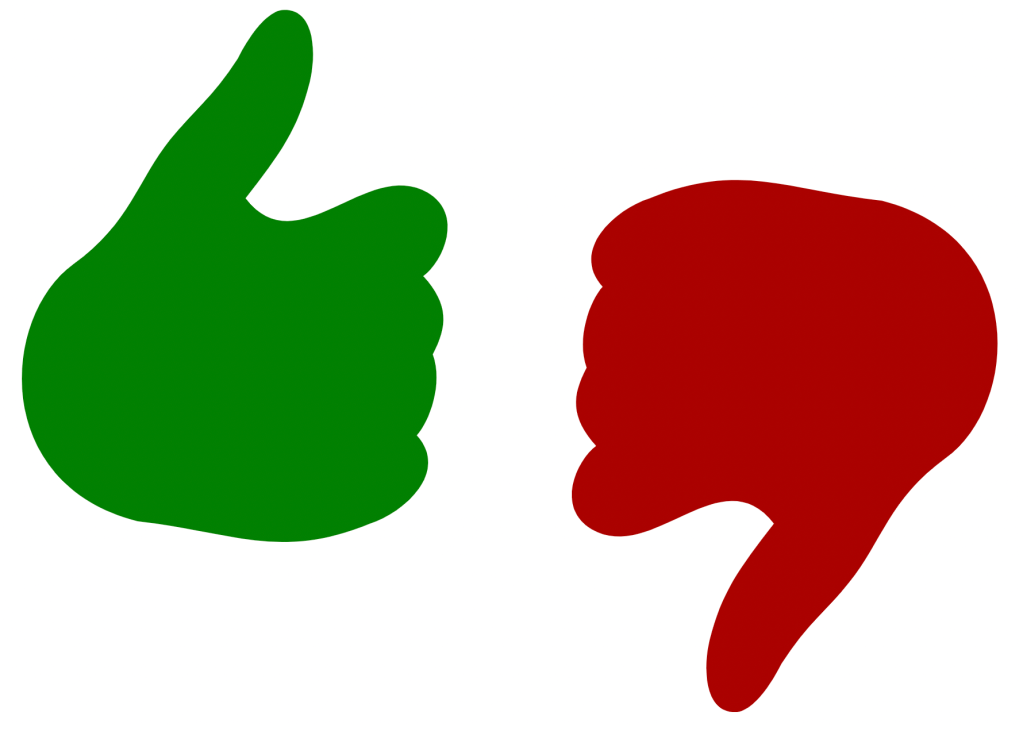 Image of a green "thumbs-up" and a red "thumbs-down" side by side.