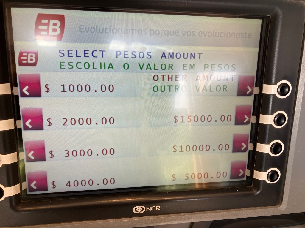 photo of the screen of an automatic bank teller machine with words in Spanish and listing 1000, 2000, 3000, 4000, 15000, 10000 and 5000 as the options