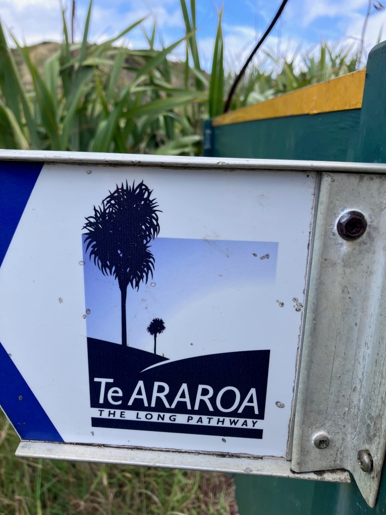 Photo of a trail sign saying Te Araroa: The Long Pathway